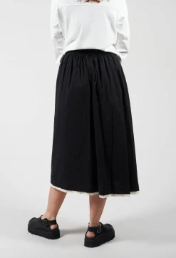 Moyuru Skirts^Contrast Raw Hem Skirt Trousers in Black / White