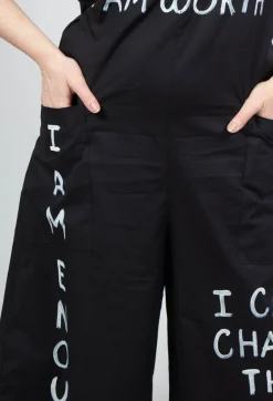 Bread and Butter Jumpsuits^Drop Crotch Jumpsuit with Lettering in Black