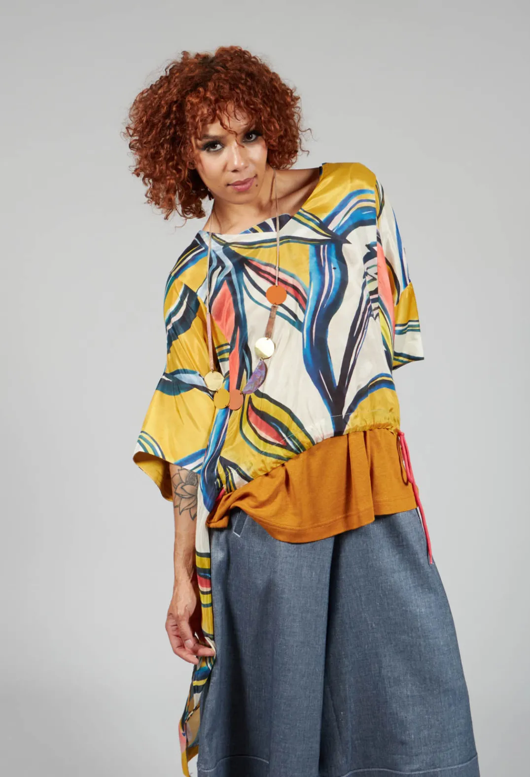 Bize Tops^Mullet Back Blouse in Original Pattern