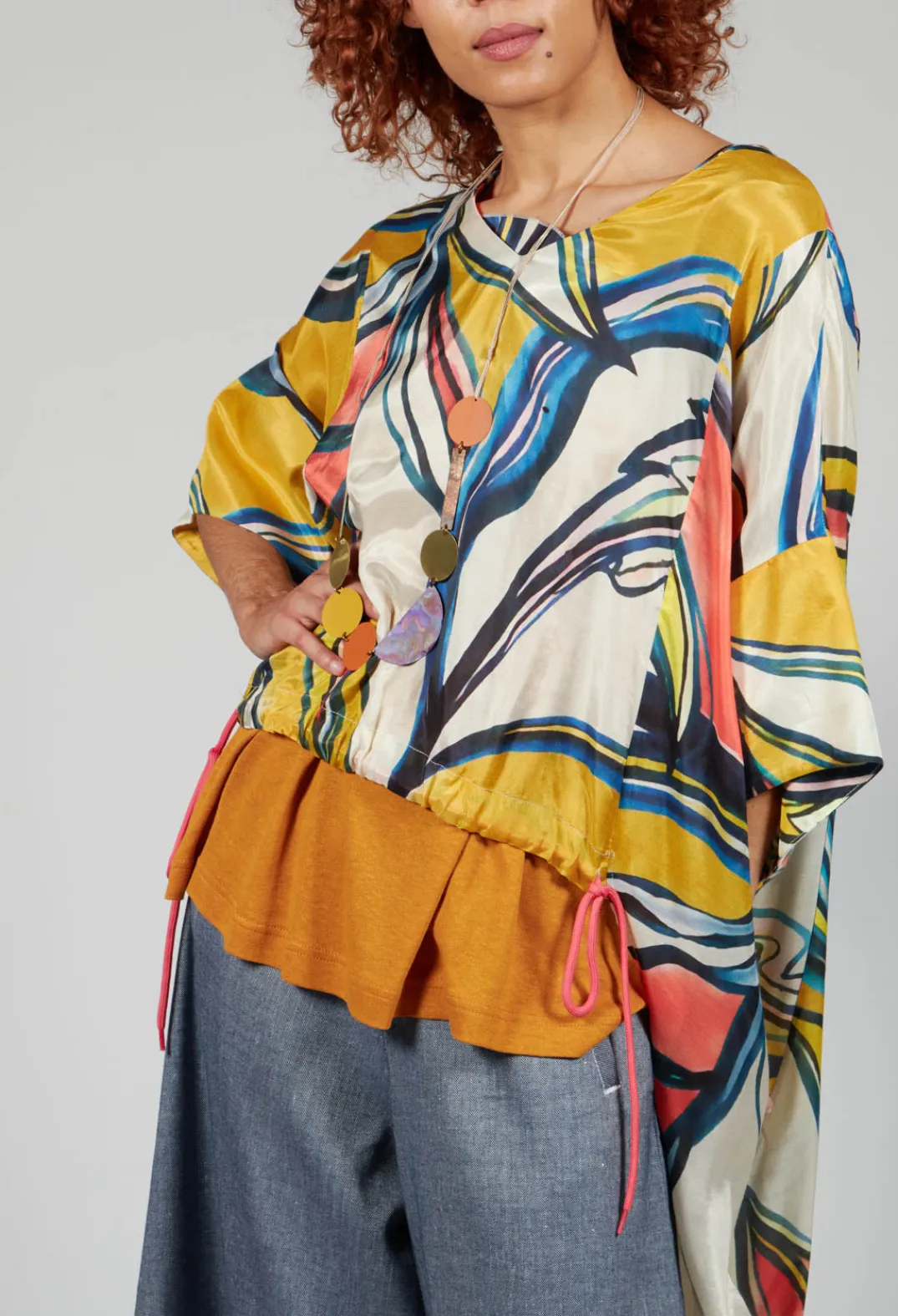 Bize Tops^Mullet Back Blouse in Original Pattern