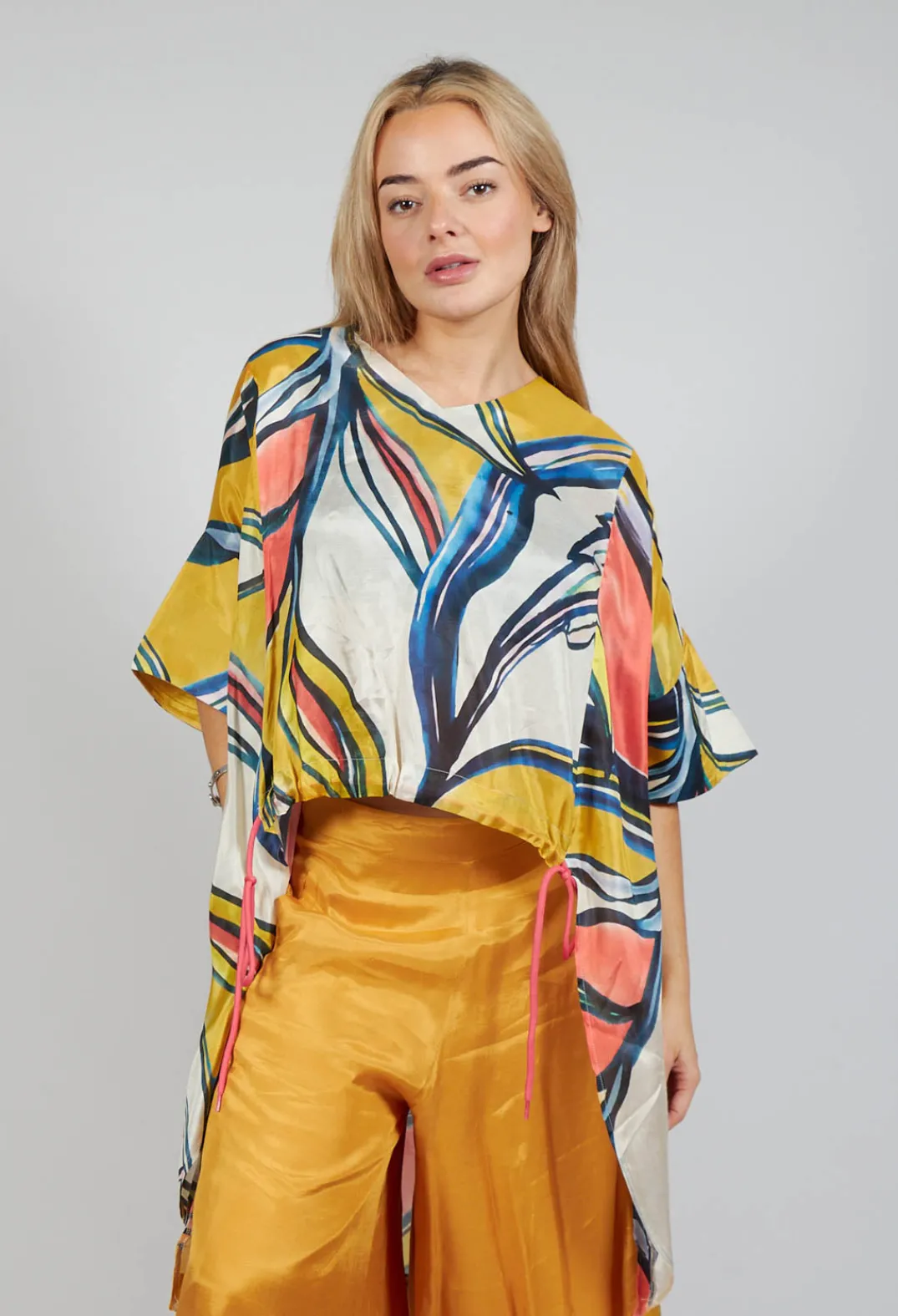 Bize Tops^Mullet Back Blouse in Original Pattern
