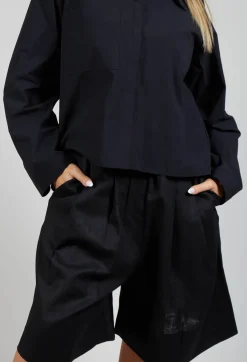 Les Filles d'Ailleurs Trousers^Pleated Shorts in Black