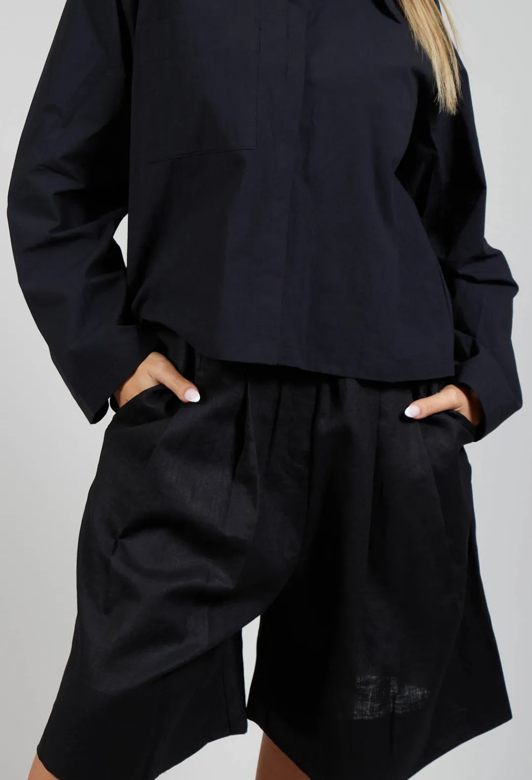 Les Filles d'Ailleurs Trousers^Pleated Shorts in Black
