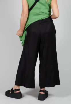 Les Filles d'Ailleurs Trousers^Pleated Wide Leg Trousers in Black