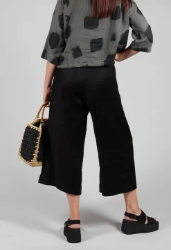 Les Filles d'Ailleurs Trousers^Pleated Wide Leg Trousers in Black