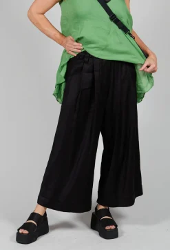 Les Filles d'Ailleurs Trousers^Pleated Wide Leg Trousers in Black