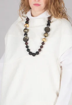 Moyuru Jumpers^Sleeveless Jumper in Cream